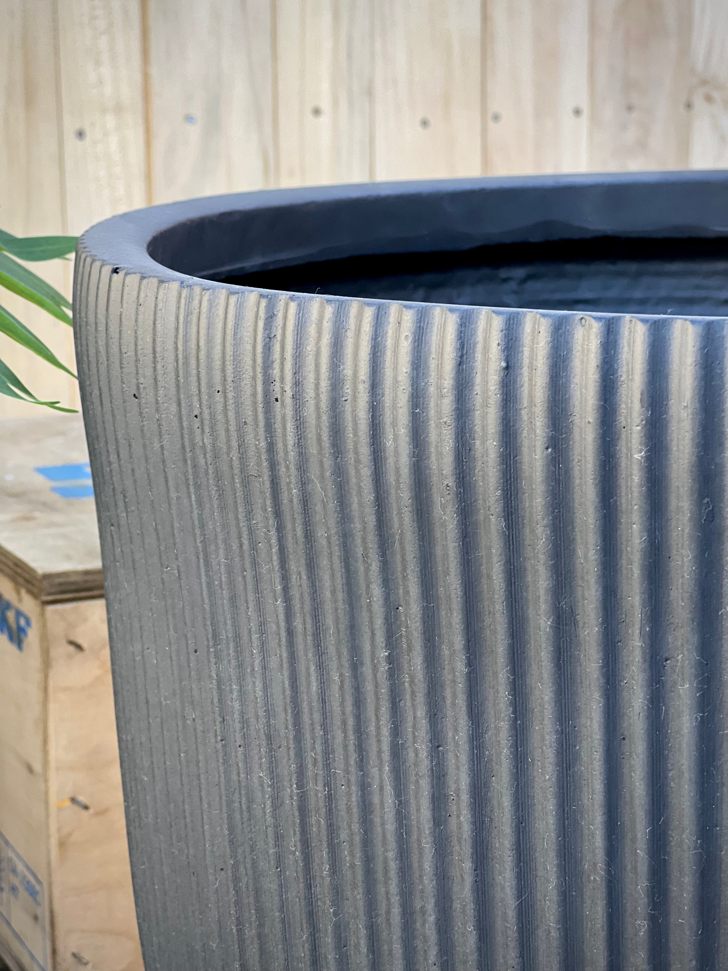 Stripy Cylinder Pot lifestyle - vertical stripes fiberclay lightweight pot